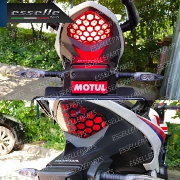 2 Pellicole - NIDO D'APE - Adesive Oscuramento Fari moto,motorini,scooter HONDA 2 Pellicole - NIDO D'APE - Adesive Oscuramento Fari moto,motorini,scooter HONDA