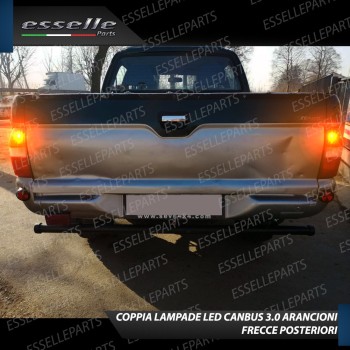 Coppia Frecce Posteriori P21W 35 LED Canbus MITSUBISHI L200 MK3 con Frecce Arancioni Coppia Frecce Posteriori P21W 35 LED Canbus MITSUBISHI L200 MK3 con Frecce Arancioni